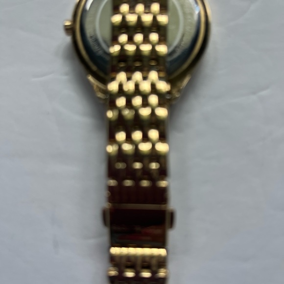Michael Kor’s Gold-Tone watch with rhinestone embellishment. - Picture 4 of 5